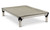 Oatmeal color fleece accessory pad shown on top of a pvc bed, the pad is held to the bed by elastic straps that hook each the legs of the bed